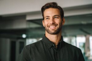 Confident man with smooth skin and relaxed expression, reflecting natural-looking Botox results for men