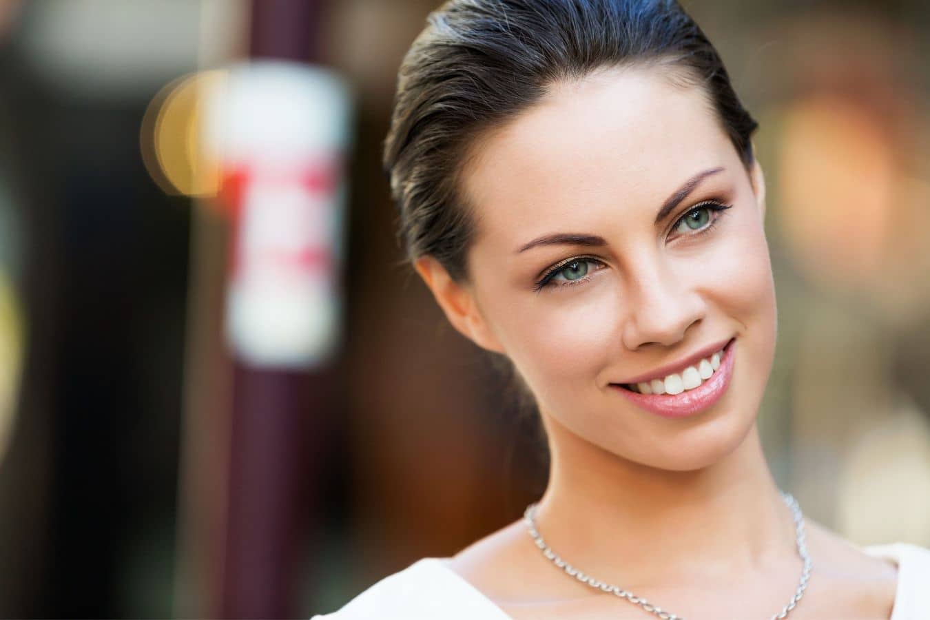 Woman with smooth skin and natural lip enhancement, representing subtle results from Juvederm filler treatment