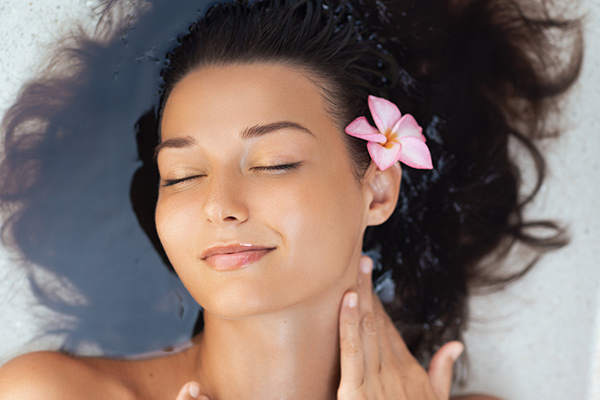 Woman with relaxed expression and smooth skin, representing natural-looking Botox results without frozen appearance