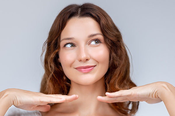 Woman with smooth, youthful skin and relaxed expression highlighting Botox results on forehead and around eyes