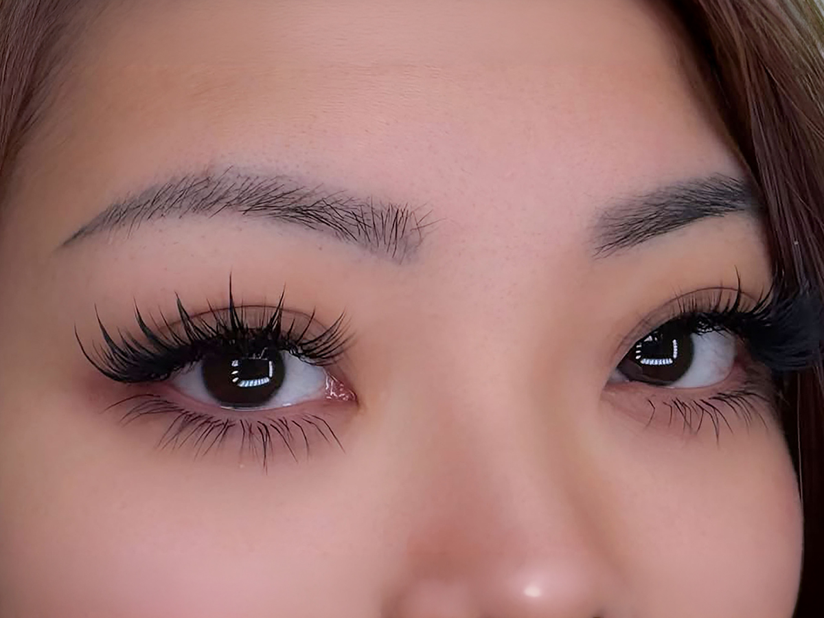 Close-up of eyes with long, full eyelashes showing results of Latisse eyelash growth treatment