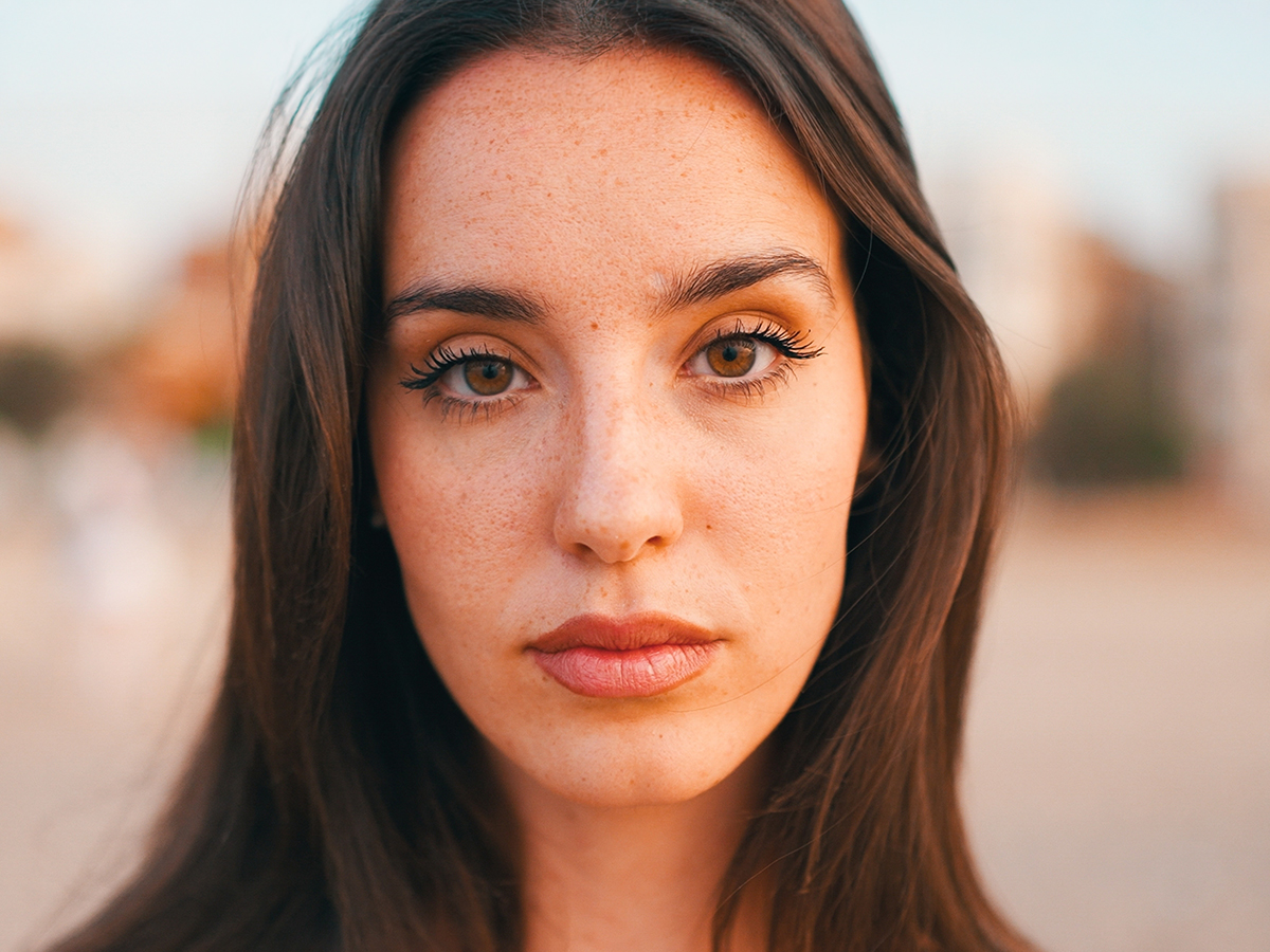 Woman with long full natural eyelashes highlighting results of Latisse treatment in New Jersey