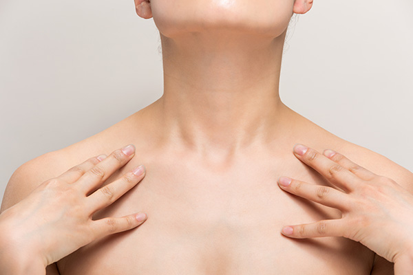 Close-up of smooth neck and jawline illustrating improved contour after neck lift procedure.