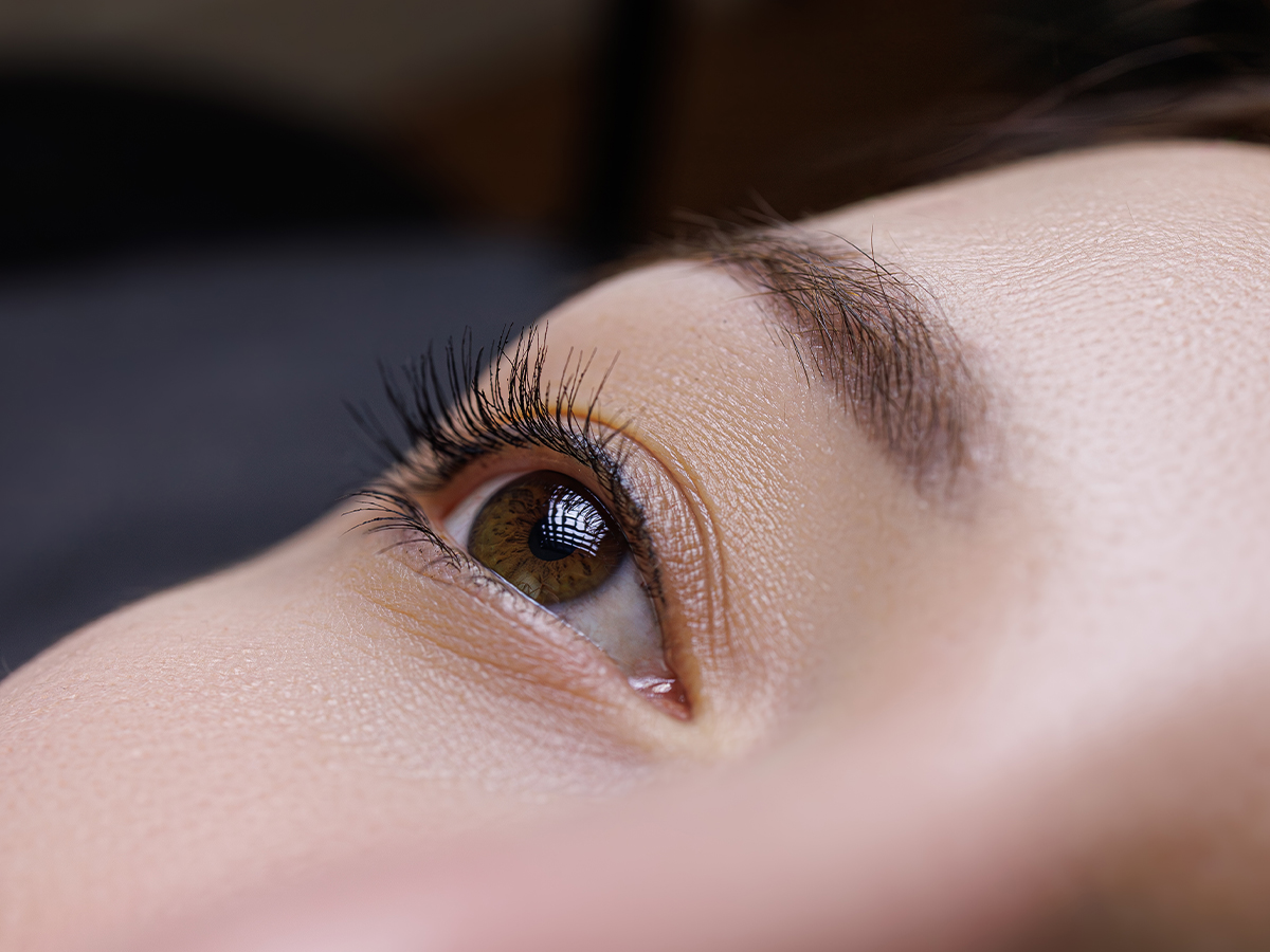 Close-up of eye with longer, fuller lashes enhanced by NovaLash eyelash extensions