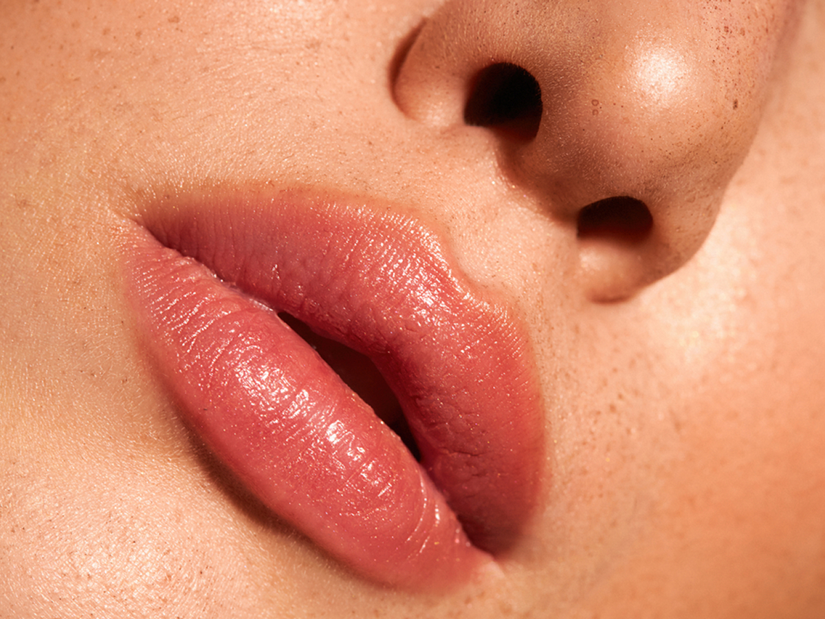 Close-up of smooth, hydrated lips showing Volbella filler results for subtle volume and fine line reduction