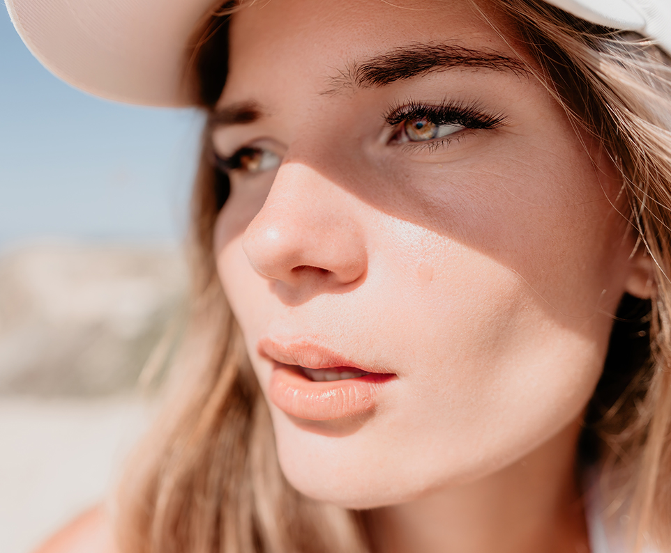 Close-up of woman’s eyes representing blepharoplasty recovery, eyelid healing, and gradual rested results.