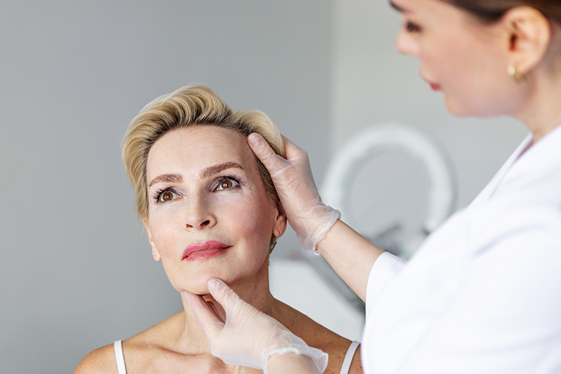 Patient consultation representing customized facelift surgery tailored to facial structure and desired outcomes.