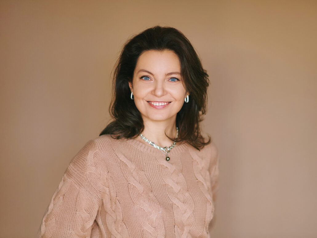 Smiling woman beside deep plane facelift article text for Princeton, NJ facial rejuvenation.