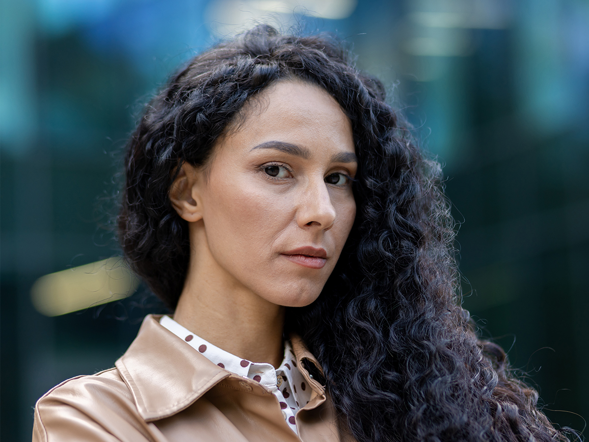 Woman with natural features representing facelift surgery for wrinkles, sagging skin, and refreshed appearance.