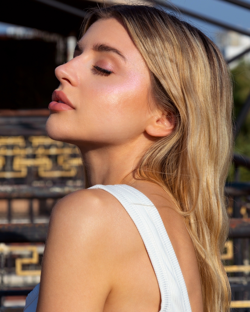 Woman beside PRP side effects content covering redness, swelling, bruising, tenderness, and uncommon injection risks.