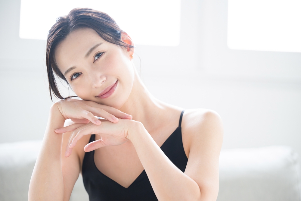 Smiling woman beside scar healing content about PRP and nanofat supporting skin repair and scar improvement.