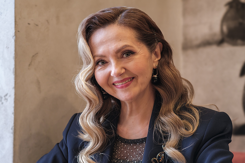 Mature woman representing traditional facelift surgery for lower face, jawline, laxity, and deeper facial wrinkles.