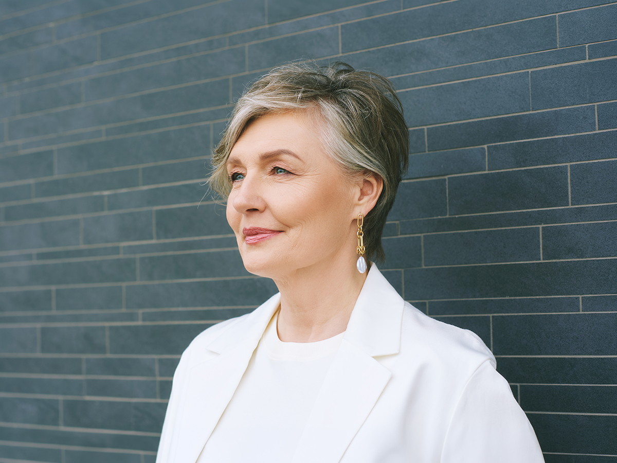 Mature woman in profile representing Voorhees facelift surgery for natural facial rejuvenation and confidence.