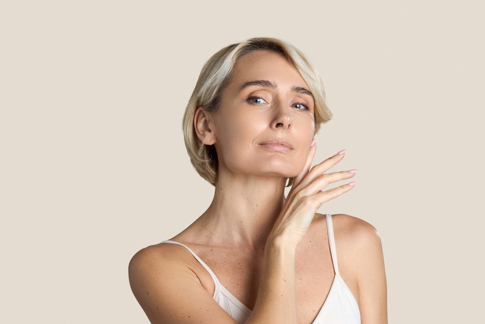 Woman beside exosome treatment steps in New Jersey, including consultation, preparation, treatment, and aftercare.
